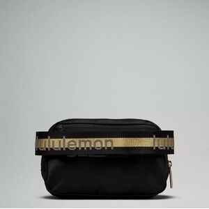 Lululemon Athletica Black and Gold Crossbody Bag